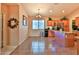 Bright eat-in kitchen with stainless steel appliances, tile flooring, and chandelier lighting at 24721 W Dove Butte --, Buckeye, AZ 85326