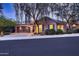 Inviting single-level home with desert landscaping, and a two-car garage under a tile roof at 25929 N 84Th Ln, Peoria, AZ 85383