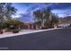 Charming single-story home with a two-car garage, mature landscaping, and a well-maintained front yard at 25929 N 84Th Ln, Peoria, AZ 85383