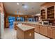 Well-equipped kitchen with stainless steel appliances, granite countertops, and a functional layout at 25929 N 84Th Ln, Peoria, AZ 85383