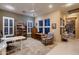 Versatile office with a desk, shelving, and plenty of natural light at 25929 N 84Th Ln, Peoria, AZ 85383