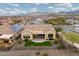 Aerial view of a charming home with a tile roof, low-maintenance landscaping, and a peaceful neighborhood setting at 26190 W Siesta Ln, Buckeye, AZ 85396