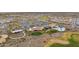 Aerial view of the community amenities, including a clubhouse, swimming pool, parking, and well-maintained landscaping at 26190 W Siesta Ln, Buckeye, AZ 85396