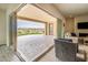 Spacious covered patio with expansive views, seamlessly blending indoor and outdoor living at 26190 W Siesta Ln, Buckeye, AZ 85396