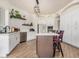 Updated kitchen with stainless steel appliances and island seating at 2732 E Hillery Dr, Phoenix, AZ 85032