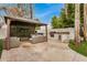 Inviting outdoor area with cozy seating under a stylish gazebo and a convenient built-in grill, ideal for gatherings at 2732 E Hillery Dr, Phoenix, AZ 85032
