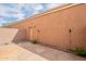 Private backyard featuring stone tile, a block wall, and tiki torches creating a serene outdoor retreat at 2875 W Highland St # 1152, Chandler, AZ 85224