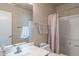 Cozy bathroom with large mirror, sink, toilet, and tiled shower at 2875 W Highland St # 1152, Chandler, AZ 85224