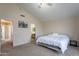 This bedroom features vaulted ceilings, carpeted floors, neutral colored walls and a ceiling fan at 2875 W Highland St # 1152, Chandler, AZ 85224