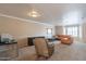 Comfortable living room featuring neutral paint, plush carpeting, and lots of natural light at 2875 W Highland St # 1152, Chandler, AZ 85224