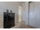 This secondary bedroom includes a dark chest of drawers at 3028 W T Ryan Ln, Phoenix, AZ 85041