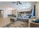 Bright open living space combines kitchen, dining, and living areas, perfect for entertaining at 3028 W T Ryan Ln, Phoenix, AZ 85041