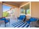 Covered patio with comfortable seating, perfect for outdoor relaxation and entertaining at 3028 W T Ryan Ln, Phoenix, AZ 85041