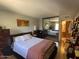 Cozy bedroom featuring a mirrored closet and ample space at 3033 E Devonshire Ave # 3003, Phoenix, AZ 85016