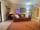 Inviting living room featuring a comfortable leather sofa and stylish decor at 3033 E Devonshire Ave # 3003, Phoenix, AZ 85016
