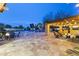 Stunning backyard with a luxurious pool, outdoor seating area, and lush landscaping at 3381 E Azalea Dr, Chandler, AZ 85286