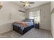 Bedroom featuring neutral carpet, decorations, and a dark storage bed with neutral bedding at 3381 E Azalea Dr, Chandler, AZ 85286