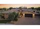 An aerial view of a single-story home with a brick driveway and a two car garage at 3381 E Azalea Dr, Chandler, AZ 85286