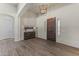 Spacious foyer with hardwood floors, stylish decor, and a well-lit entrance area at 3381 E Azalea Dr, Chandler, AZ 85286