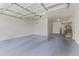 A meticulously maintained and freshly painted oversized three-car garage with clean epoxy floors at 3381 E Azalea Dr, Chandler, AZ 85286