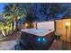 Backyard hot tub with a view of desert landscaping, providing a private and luxurious relaxation space at 3381 E Azalea Dr, Chandler, AZ 85286
