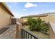 Paver walkway, custom metal gate, and green space in a unique side yard area ready for customization at 3381 E Azalea Dr, Chandler, AZ 85286