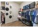 Well-organized walk-in closet with ample storage, including shelves and hanging rods at 3381 E Azalea Dr, Chandler, AZ 85286