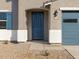 Close up on the front door of a single-Gathering home featuring modern lock and hardware at 37458 W San Clemente St, Maricopa, AZ 85138