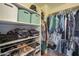 Organized walk-in closet with shelving, hanging racks, and plenty of storage space for clothes and accessories at 3795 W Mercury Way, Chandler, AZ 85226