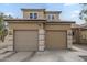 Spacious attached two-car garage offering convenient parking and storage in a modern home exterior at 3795 W Mercury Way, Chandler, AZ 85226