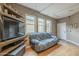 Stylish living room featuring a comfortable couch, natural light, and a clean aesthetic, perfect for relaxation at 3795 W Mercury Way, Chandler, AZ 85226