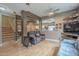Cozy living room features wood floors, neutral paint, open access to staircase and kitchen at 3795 W Mercury Way, Chandler, AZ 85226