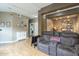 Relaxing living room featuring a comfortable couch, open floor plan, and natural light, perfect for gathering at 3795 W Mercury Way, Chandler, AZ 85226