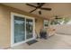Spacious covered patio area with outdoor kitchen, sink, and access to backyard at 3795 W Mercury Way, Chandler, AZ 85226