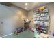 Bright play room with toy storage, hanging hammock chair, and unique wall decor at 3795 W Mercury Way, Chandler, AZ 85226
