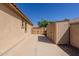 Backyard featuring a shed on the side of the home at 40707 W Pryor Ln, Maricopa, AZ 85138