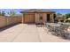 Backyard featuring table and chairs at 40707 W Pryor Ln, Maricopa, AZ 85138