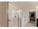 Bright bathroom featuring a glass-enclosed shower and separate soaking tub, creating a spa-like retreat at 40707 W Pryor Ln, Maricopa, AZ 85138