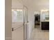 Modern main bathroom featuring a shower, tub, and vanity at 40707 W Pryor Ln, Maricopa, AZ 85138