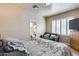 Bedroom featuring a sofa and ensuite bathroom at 4539 W Beautiful Ln, Laveen, AZ 85339