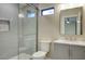 Modern bathroom featuring a glass-enclosed shower, sleek vanity, and stylish fixtures for a luxurious feel at 4602 N 74Th Pl, Scottsdale, AZ 85251