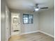 Bright bedroom with a window, ensuite bathroom, and neutral decor, creating a comfortable space at 4602 N 74Th Pl, Scottsdale, AZ 85251