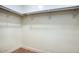Walk-in closet with ample shelving and hanging space for efficient storage solutions at 4602 N 74Th Pl, Scottsdale, AZ 85251
