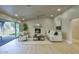 Comfortable living room featuring a fireplace, neutral decor, and sliding doors to the outdoor patio at 4602 N 74Th Pl, Scottsdale, AZ 85251