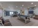 Entertaining basement featuring a pool table, lounge area, and bar setup at 4617 E Elmwood Cir, Mesa, AZ 85205