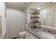 Bathroom featuring a shower and a vanity with granite countertop at 4617 E Elmwood Cir, Mesa, AZ 85205