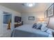 Cozy bedroom featuring neutral tones, soft bedding, and an inviting atmosphere at 4617 E Elmwood Cir, Mesa, AZ 85205