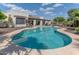 Sparkling private pool with lush landscaping and a serene setting for relaxing and enjoying the outdoors at 4617 E Elmwood Cir, Mesa, AZ 85205