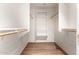 Walk-in closet with hardwood floors and plenty of shelving for storage at 4901 S Vista Pl, Chandler, AZ 85248