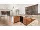 Well-lit kitchen features granite countertops and stainless steel sink for a modern and functional space at 4901 S Vista Pl, Chandler, AZ 85248